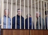 Five Russian officials being sentenced on corruption charges in Moscow last month (TASS)
