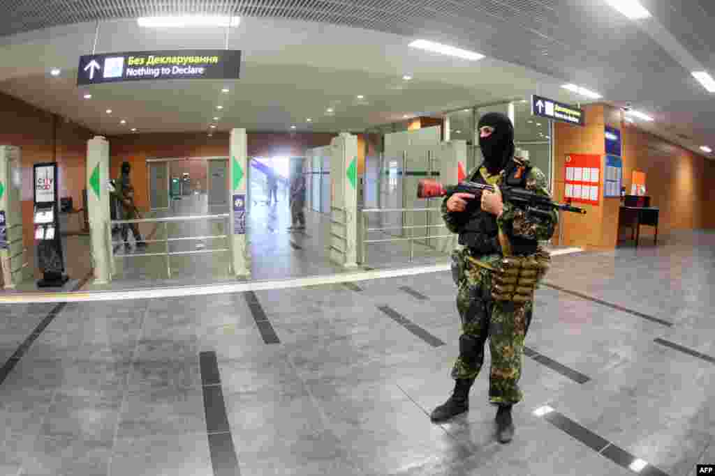 Pro-Russian militants patrolling Donetsk's international airport early on May 26, before the heavy fighting erupted.