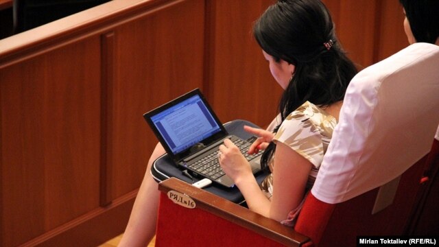 The proposed dress code would apply not only to deputies but also to visitors to parliament, such as this Kyrgyz journalist.