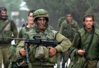 Israeli soldiers conducting an operation near the Lebanese town of Metula today (epa)