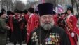 A Russian Orthodox priest attends a rally marking the second anniversary of Russia's annexation of Ukraine's Crimea region in the Black Sea port of Sevastopol on March 18. 