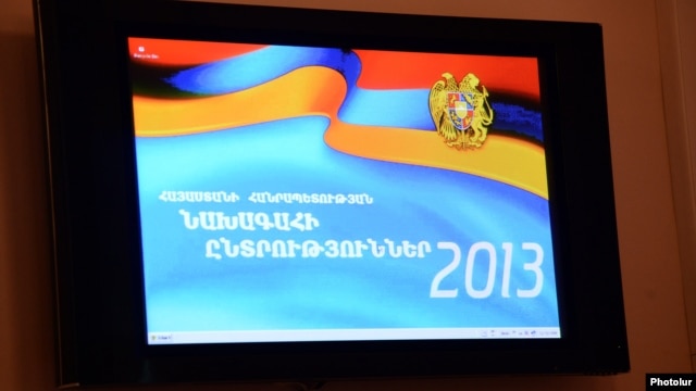 Armenia -- The official banner of the February 2013 presidential elecition projected from a monitor at the Central Election Commission, Yerevan, 14Jan2013.