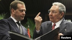 Cuban President Raul Castro (right) and Russian Prime Minister Dmitry Medvedev during their meeting in Havana on February 21.