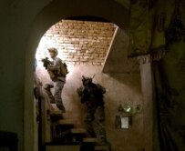 U.S. troops searching a house in Baghdad in August 2006 (epa)