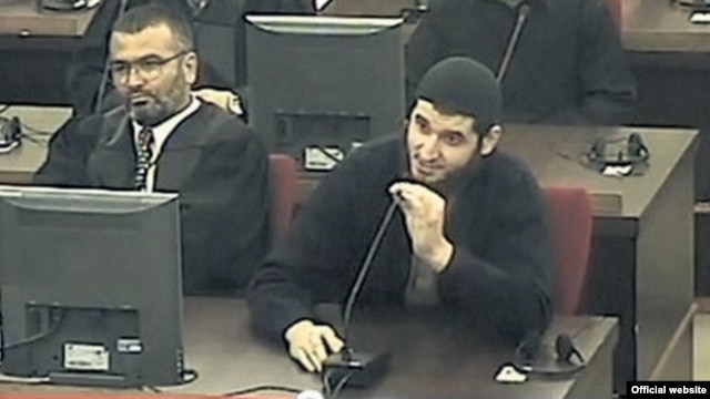 Mevlid Jasarevic (right) speaks in court during his trial.