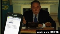 Пользователь читает SMS-массовое сообщение, что на поправки к земельному кодексу введен мораторий. Алматы, 6 мая 2016 года.
