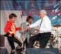 Russia – 1996 presidential election – President Boris Yeltsin (R) dancing during an election rally, Rostov, 10Jun1996. Source: AFP.