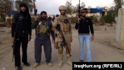 قوات أمنية ومقاتلو عشائر في الخالدية