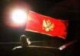 A pro-independence supporter celebrates after Montenegrins narrowly voted for independence in a referendum in May (AFP)