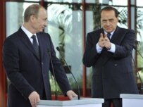Italian Prime Minister-elect Silvio Berlusconi (right) and Russian President Vladimir Putin (AFP)