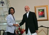 President Karzai (right) with Secretary Rice in Kabul on June 28 (epa)
