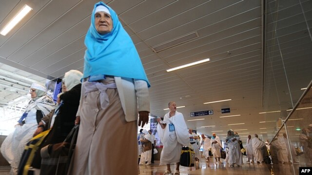 Pilgrims from Iran arrive at Jeddah airport in Saudi Arabia on October 30. More than 500 have now been sent back home, Iran says.