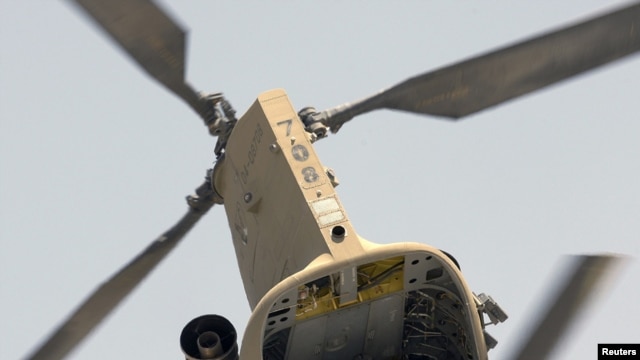 A U.S. Air Force CH-47 Chinook helicopter takes off from Camp Nathan Smith in Kandahar City on May 11.