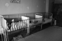 Children confined in cribs at Sasca Mica Rehabilitation Center, 2005 (MDRI)