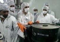 Workers at Iran's uranium-conversion facility at Isfahan