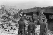U.S. troops inspect the site of the October 1983 bombing of a military barracks in Beirut (AFP)