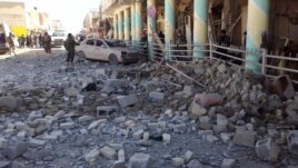 Pamje e vendit ku ka eksploduar një bombë gjatë valës së sotme të sulmeve në Irak