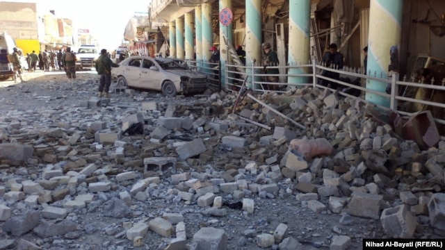 Pamje e vendit ku ka eksploduar një bombë gjatë valës së sotme të sulmeve në Irak