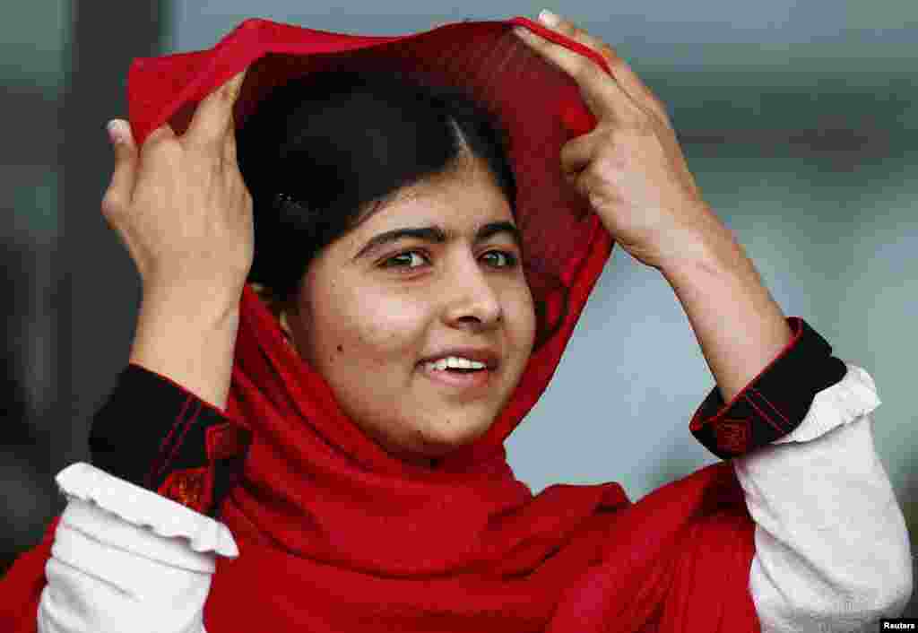 Malala Yousafzai, the Pakistani schoolgirl who was shot by the Taliban, appears at a library opening in Birmingham, England. (Reuters/Darren Staples)