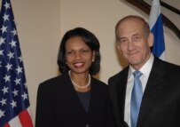 Secretary Rice (left) with Israeli Premier Ehud Olmert  in Jerusalem on October 4 (epa)