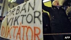 Hungarian protesters demonstrate against Prime Minister Viktor Orban earlier this month.