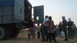 Students being transported in the back of trucks to pick cotton in Uzbekistan's Jizzakh region, 6Sep2012