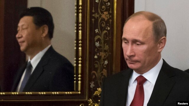 Российский и китайский лидеры в 2013 году