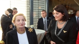 Kosovo President Atifete Jahjaga and former U.S. Secretary of State Madeleine Albright at the women's conference in Pristina.