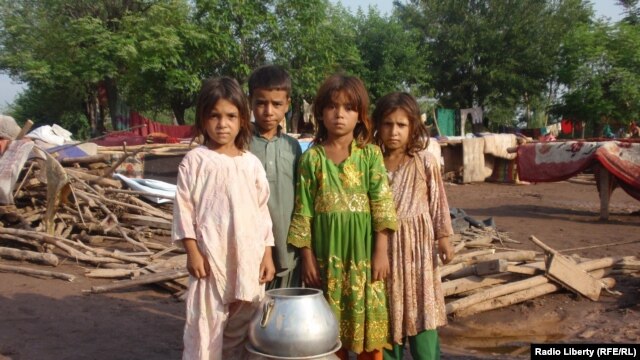 Refugee Afghan children in Pakistan. There are more than 3 million Afghan refugees living in the border regions of neighboring Iran and Pakistan.