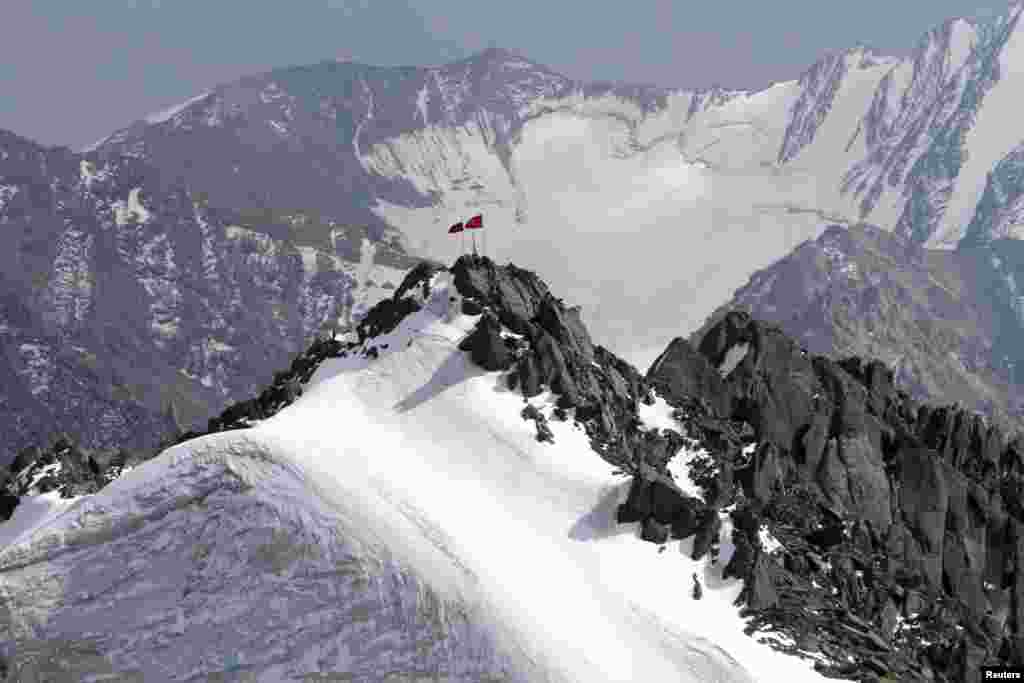 Members of the opposition Ata-Meken (Fatherland) party have complained about the mountain's new name, saying it violates a Kyrgyz law that bans naming locations after living people.