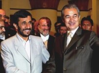 Iran's Ahmadinejad (left) with Malaysian Prime Minister Abdullah Ahmad Badawi on August 3 (epa)