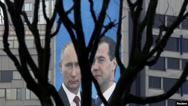 A campaign poster of Russian President Dmitry Medvedev (right) and Prime Minister Vladimir Putin appeals to people to vote for their political party, United Russia, in parliamentary elections in December.