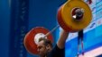 Georgian Weightlifter Sets Record, Wins Gold, Besting Iranian Champion