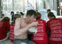 Nashi youths at Lake Seliger in July. The T-shirts are emblazened with the Russian national anthem