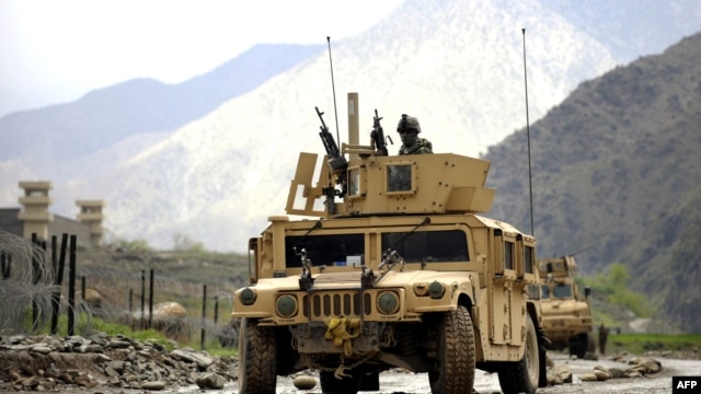 A U.S. Army humvee patrols in Nuristan Province in April 2009, after coalition forces pulled back from outlying bases there.