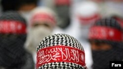 A Iranian volunteer registering for a suicide attack