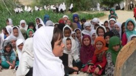 Schoolgirls study in an open air school in the outskirts of Jalalabad, Afghanistan, 11Sep2012