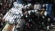 Syria -- Opposition activists shows mourners gathering around coffins and bodies during a mass funeral in the flashpoint city of Homs, 04Feb2012 