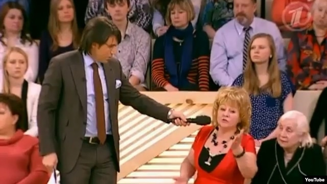 In February 2012, Russian television's "Let Them Talk," hosted by Andre Malakhov (pictured in a March 2012 broadcast), brought on Yorgin Tillaev's wife and sister to beg Nikolai Melnikov for forgiveness on prime-time TV.