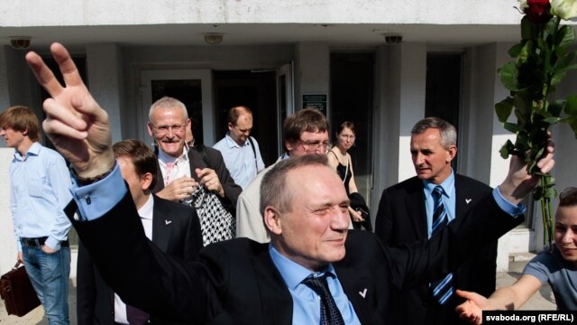 Former Belarusian presidential candidate Uladzimer Nyaklyaeu greeting supporters after being given a suspended sentence for organizing postelection protests last December. 