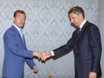 Russia's First Deputy Prime Minister Dmitri Medvedev (left) meets with Ukrainian Fuel and Energy Minister Yuriy Boyko in Moscow on October 2 (ITAR-TASS)