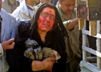An Iraqi mother in Ba'qubah mourns for her two police officer sons who were killed in an insurgent explosion (AFP)