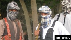 Militants of the Islamic Movement of Uzbekistan (IMU) pose for photo in Afghanistan's Kunduz Province.