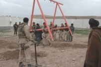 NATO troops installing a playground in Afghanistan (undated courtesy photo)