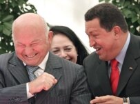 President Chavez (right) joking with Moscow Mayor Yury Luzhkov today (epa)