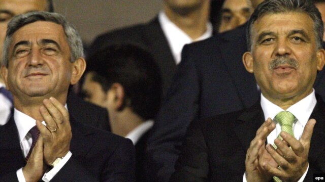 Turkey -- President Abdullah Gul (R) with his Armenian counterpart Serzh Sarkisian at Turkey vs Armenia FIFA 2010 World Cup group match in Bursa, 14Oct2009