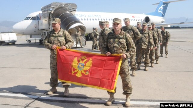 Солдаты черногорской армии возвращаются из боевой миссии в Афганистане. Сентябрь 2012 года