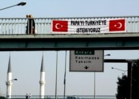 A banner on a bridge in Istanbul hung in October reads, 'We don't want the pope in Turkey' (epa)