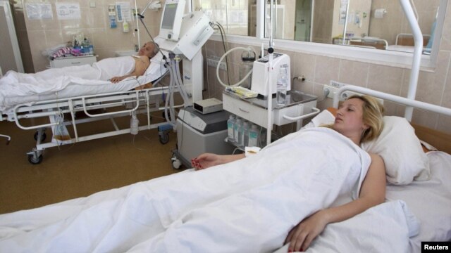 People injured in the bombings recover in a Dnipropetrovsk hospital in late April.
