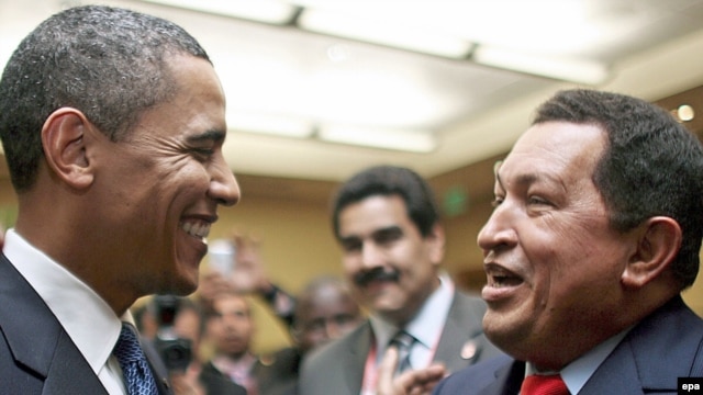 Venezuelan President Hugo Chavez (right) talks with his U.S. counterpart Barack Obama in Port of Spain.
